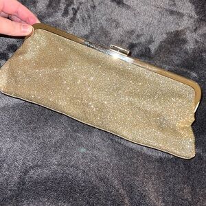 Small gold glitter clutch